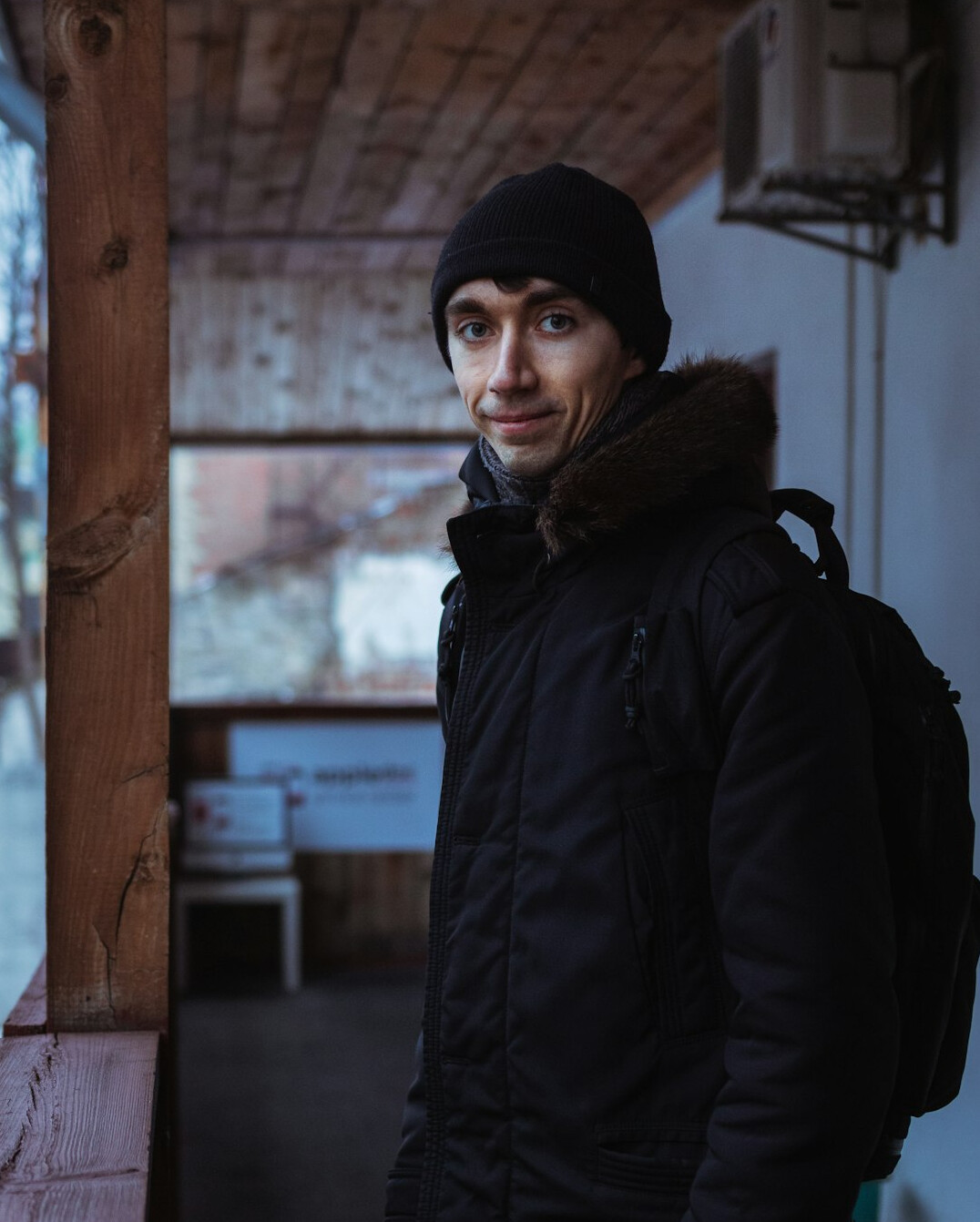 Portrait of a man journalist in a dark jacket